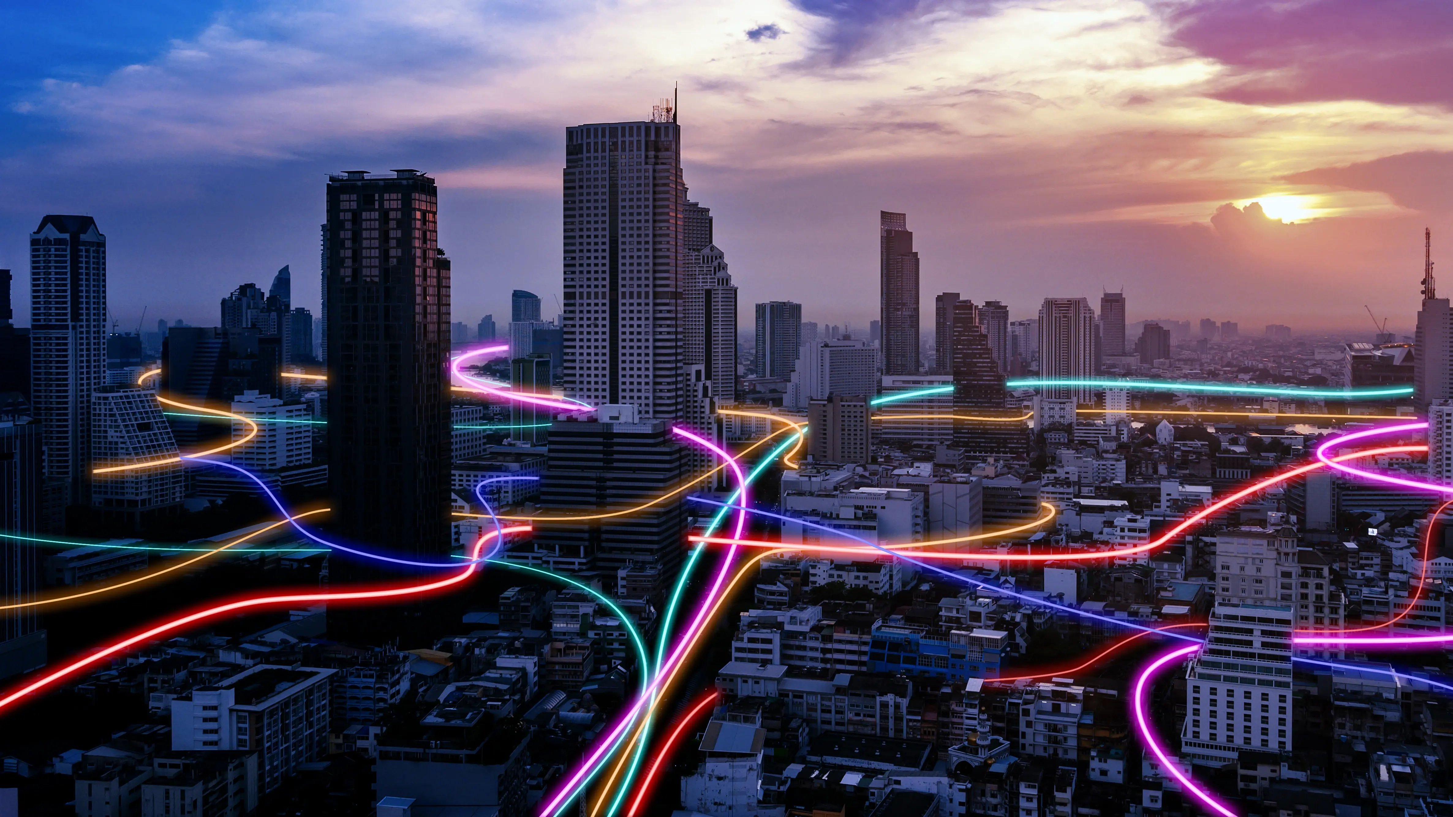 Une ville moderne. La transition numérique est mise en avant et représentée par des faisceaux lumineux colorés.
